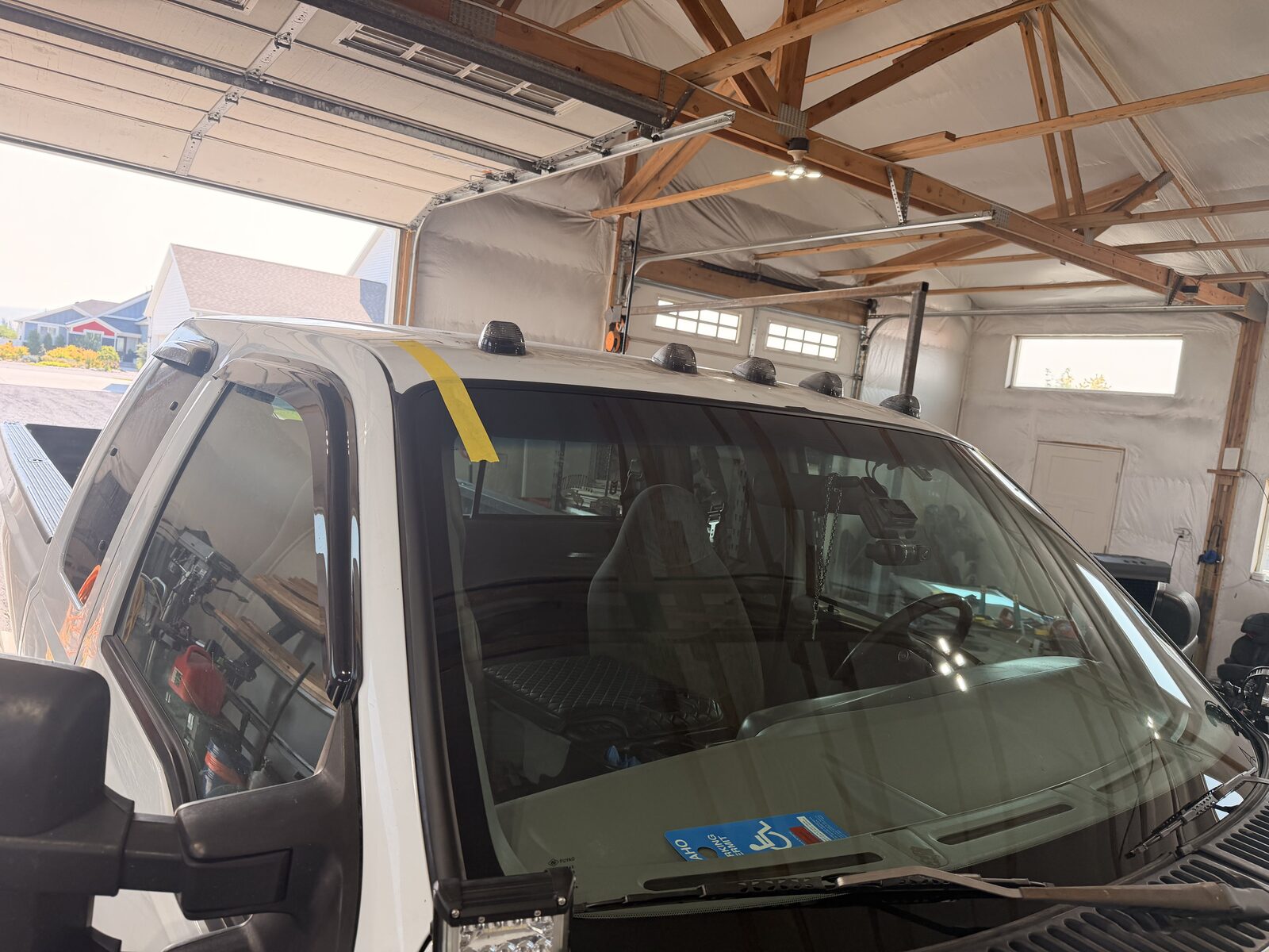 Heavy-duty pickup windshield replaced in the shop with OE-equivalent glass.